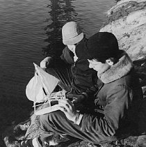 Standley Goodwin holding boat with Roger Stone