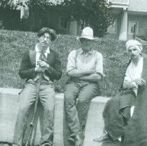 Three men in costumes