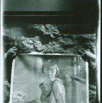 Painting of woman sitting