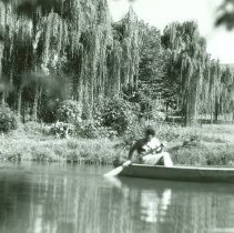 Rower on pond