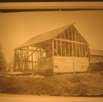 Old barn being taken down at William Wood Farm, 1837 Main Street