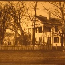 House with pillars and fence