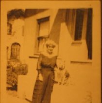 Unidentified woman with a dog