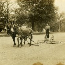 Roading raking machine