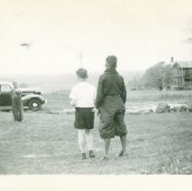 Boys playing with a ball near the Mitchell-Grant house on Buckland Road