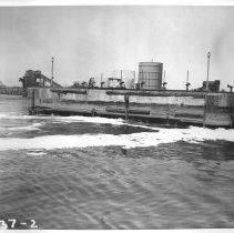 Northeast Plant. Southwest end of pier from tug.