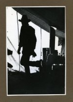 Man at Fales' hunting camp in the Thorofare