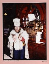 Gunslinger behind the Irma Hotel bar