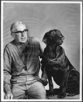 Ted Ogston (retired Park Ranger) & his black lab