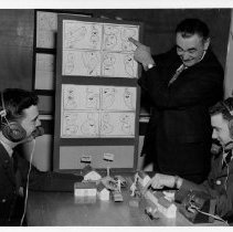 Hungarian instructor Michael Finta with students in a classroom lab, 1965.
