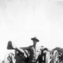 76th Field Artillery: 75mm gun and limber with trooper posing, n.d.
