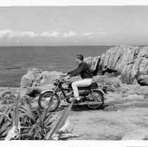 Carlson on a motorcycle by the ocean, 10,000th Russian Graduate, 6 April 19