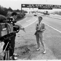 KSBW Reporter at main gate, 1990s