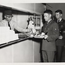 DLIWC Students in food line at an event, 1965.