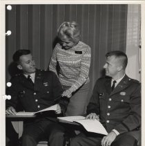 Defense Language Institute West Coast (DLIWC): Spanish students Cpt. Sloan, & Lt. Horn working with instructor Maria Terese De Soto in the classroom
