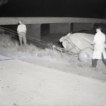 Man Watch as Auto Wreck is Towed from Ditch in Napa County, 1942