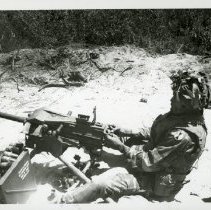 Fort Ord -field maneuvers: soldier firing MK 19