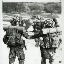 Fort Ord -field maneuvers: soldiers talking to each other