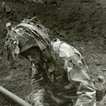 Fort Ord -field maneuvers: assembly of Bangalor torpedo during demolition training