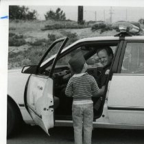 Fort Ord - Security/Police/Safety: police officer with boy