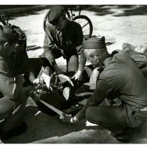 Medical Army Stabilize Unknown Man's Leg, First Medical Regiment, 1942