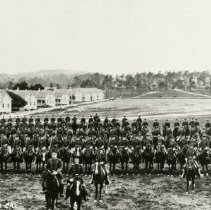 1st Calvary: 3rd squadron in formation on horseback at Soldier Field