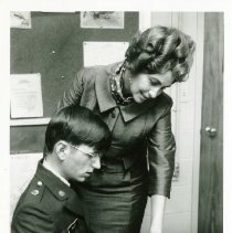 DLI West Coast, Mrs. Ada Martines assisting Pfc. Mark Kelley, 1970.