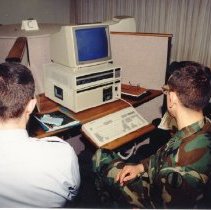 Students improve their skill in Arabic with the aid of the DLI Computer Cen