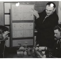 Hungarian instructor Michael Finta with students in a classroom lab, 1965.