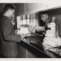 DLIWC Students in food line at an event, 1965.
