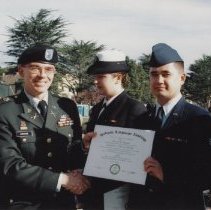 Colonel Simone presents an Associate of Arts in Arabic degree, circa 2005.