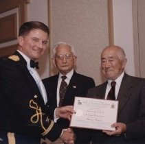 Col. Kevin Rice presents honorary degree to Shigeya Kihara, 2 Nov. 2001.