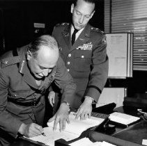 Brig. Gen. J.N. Carter signs the ALS visitors book, 1959.