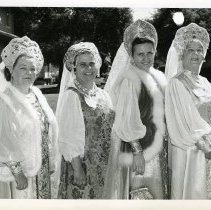 Costume; Russian costumes worn by (l to r) East Slavic Division instructors Mrs. Ann Kravshina, Miss Olga Chebyshowa, Mrs. Tatian Romani and Mrs. Kaenia Tarkov (wife of an ESD instructor), 21 Sept. 1966