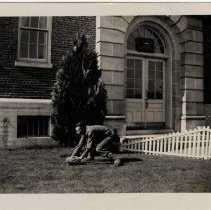 Soldier Poses with a Football