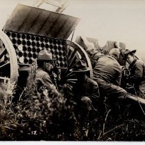 Soldiers with artillery on the field