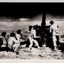 An M-2 75mm. gun in action, Fort Ord