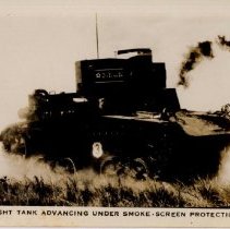 light tank advancing under smoke-screen protection