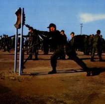 Colored image of soldiers in combat training with bayonets