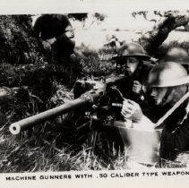Machine Gunners With .50 Caliber Gun