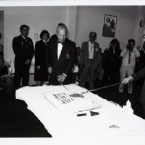 50th Anniversary of Defense Language Institute: Colonel Fischer and Retired Brigadier General James Collins cut the Cake with Sabers