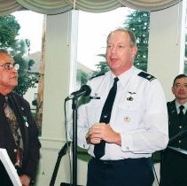 Colonel Daniel L. Scott, Assistant Commandant, speaks at Ben De La Selva's retirement party from the Defense Language Institute Foreign Language Center