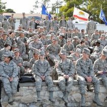 Sailor and Airmen Watch Change of Command Ceremony