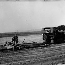Sergeant Operates Tractor for Baseball Diamond Construction, 1943