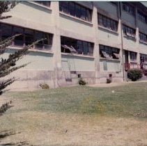 Soldiers Sit Outside Building at Fort Ord