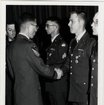 Unknown Sergeantis Congratulated at Ceremony at Fort Ord