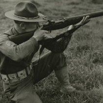 Unknown Sergeant Aims Rifle during Training at Fort Ord