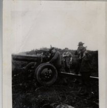 Soldiers Operate a 105mm Towed Howitzer Gun at WWII Training Camp