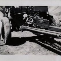 Men Standing Behind Artillery at WWII Training Camp