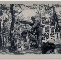 Frank Davies Washes Laundry Outside at Fort Lewis